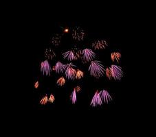 Beautiful light for celebration of Festive colorful fireworks display on night sky photo