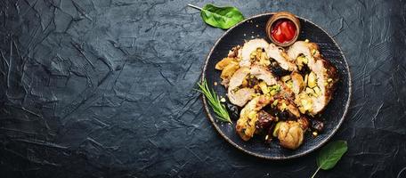 Meat roll with dates and apples photo