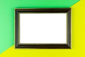 Wooden frame yellow background photo