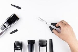 scissors and combs on white photo