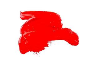 red paint on white background photo