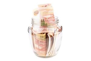 Glass jar with money photo