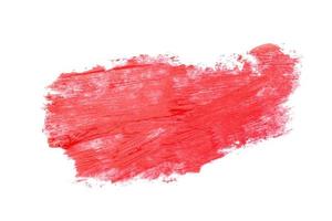 red lipstick on white background photo