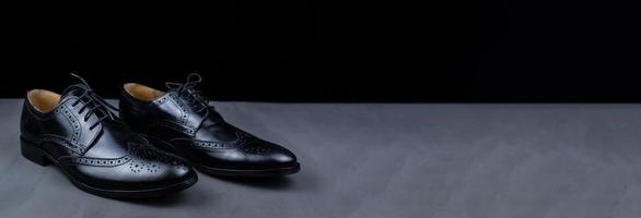 men's shoes black background photo