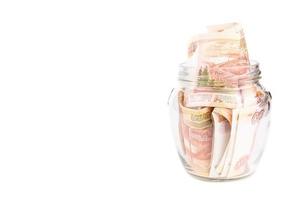 Glass jar with money photo