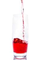 Cherry juice on white background photo