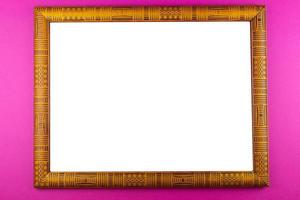 Wooden frame pink background photo