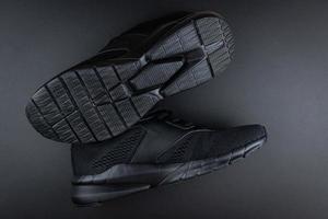 sneakers on black background photo