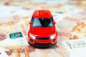 Toy car on money photo