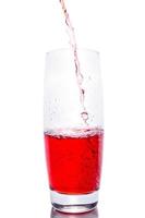 Cherry juice on white background photo