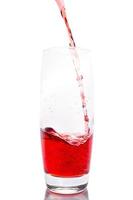 Cherry juice on white background photo