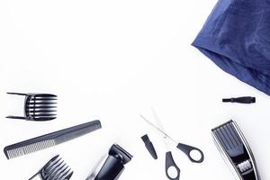 scissors and combs on white photo