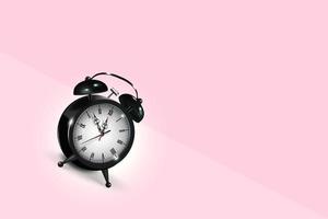 Black vintage alarm clock rolls down the slope with colored background. vector