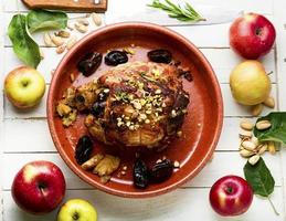 Meat roll with dates and apples photo