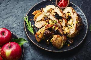 Meat roll with dates and apples photo