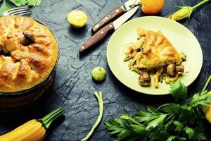 Homemade pie with zucchini and squash photo