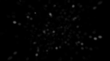 Abstract loop dust particles floating on black background video