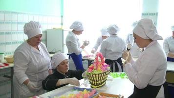 cook in the kitchen preparing dessert on the table video