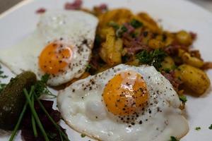 Farmers Breakfast with ham eggs and fried potatoes photo