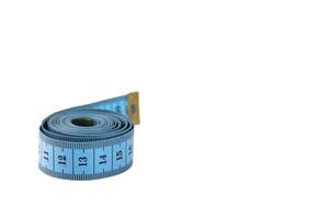 Blue measuring tape, soft ruler isolated on white background photo