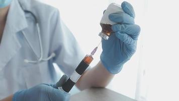 Medical Research Laboratory Portrait of a Female Scientist Wearing Face Mask Using Micro Pipette for Analysis. Advanced Scientific Lab for Medicine, Biotechnology Development. Close-up Shot video