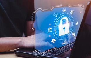 cybersecurity security concept Protecting digital assets from hacks, attacks, implementing strategies. Businessman preventing mobile or computer data hacking. online scammers, denial of service DDoS photo