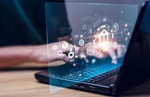 Businessman using online banking on laptop and making payments. Digital marketing.Finance and banking networking.Online shopping and customer network connection icons,Cybersecurity.Business technology photo