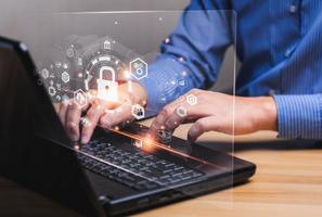 Data protection privacy concept and Internet Security and Cyber Network. data protection programmer with laptop computer with padlock icon. Hackers' digital crimes. customer confidential information. photo