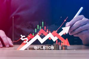 concept of higher price inflation. Businessman with a financial graph, the economic condition of the currency tends to decline continuously. cash flow photo