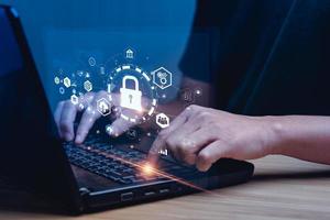Data protection privacy concept and Internet Security and Cyber Network. data protection programmer with laptop computer with padlock icon. Hackers' digital crimes. customer confidential information. photo