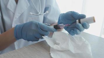 Medical Research Laboratory Portrait of a Female Scientist Wearing Face Mask Using Micro Pipette for Analysis. Advanced Scientific Lab for Medicine, Biotechnology Development. Close-up Shot video