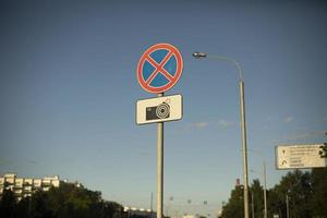 Sign of shooting on road. Warning about cameras on highway. photo