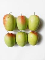 apples of an elongated shape on a white background. kandil sinap apple photo