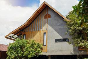 house, accommodation, hotel , GUEST HOUSE, vacation home Modern style, Cement wall decorated with bamboo. Soft and selective focus. photo