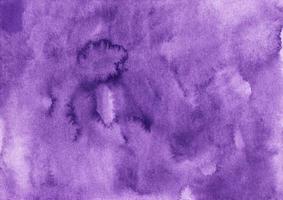 Watercolor old purple liquid background texture. Deep violet aquarelle backdrop. Stains on paper. photo