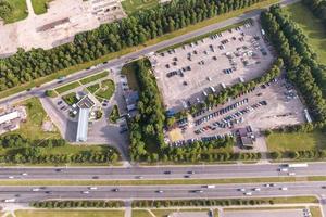 aerial view on large open air parking lot for cars for residents of area photo