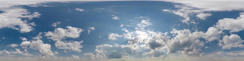 blue sky with beautiful clouds as seamless hdri 360 panorama view with zenith for use in 3d graphics or game development as sky dome or edit drone shot photo