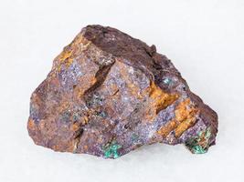 Cuprite and Malachite in Limonite mineral on white photo