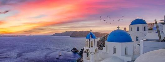 Europe summer destination. Traveling concept, sunset scenic famous landscape of Santorini island, Oia, Greece. Caldera view, colorful clouds, dream cityscape. Vacation panorama, amazing outdoor scenic photo