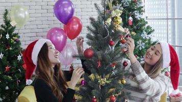 Asian women celebrate Christmas party happily video