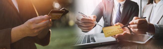 Woman hands holding and using cradit card for shopping online. photo