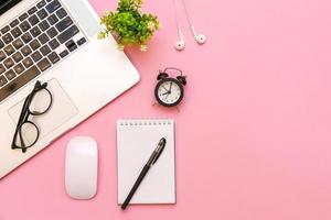 Top view of laptop and glasses, work environment for online work or learning photo