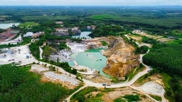 aerial photograph of a large pit of a gypsum mine. A large gypsum mine. Mining and Geology Industry Concepts photo