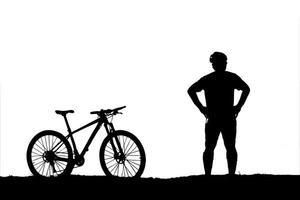 silhouette of a person riding a bike photo