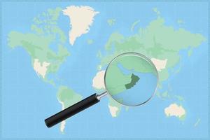 Map of the world with a magnifying glass on a map of Oman. vector