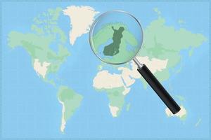 Map of the world with a magnifying glass on a map of Finland. vector