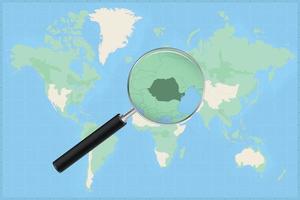 Map of the world with a magnifying glass on a map of Romania. vector