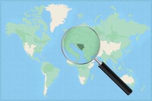 Map of the world with a magnifying glass on a map of Bosnia and Herzegovina. vector