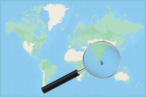 Map of the world with a magnifying glass on a map of Sri Lanka. vector