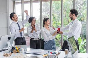 boss presented an award for outstanding female employees, colleagues congratulated photo